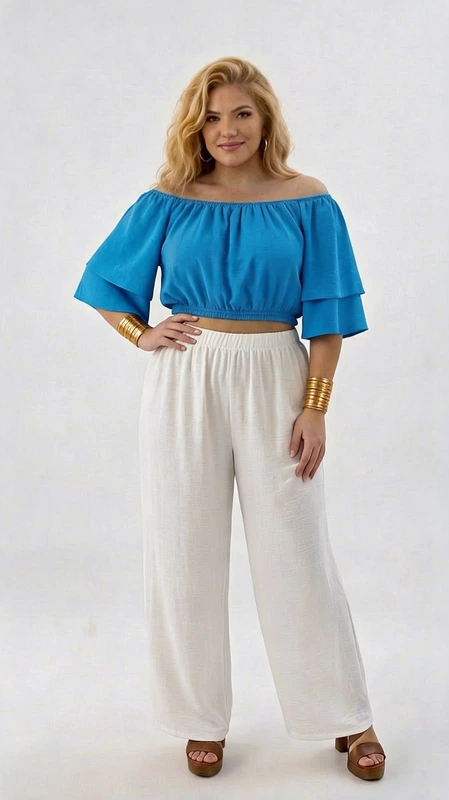 Κροπ τοπ γαλάζιο καλοκαιρινό plus size - CTSPL113 | Candiashop Boutique, Ανανεώστε το καλοκαιρινό σας στυλ με αυτό το εντυπωσιακό σύνολο που συνδυάζει κομψότητα και άνεση. Το κροπ τοπ σε λαμπερό γαλάζιο χρώμα διαθέτει μοντέρνο σχεδιασμό με έξω τους ώμους και φαρδιά μανίκια 3/4 που προσφέρουν ανάλαφρη αίσθηση. Η ελαστική λάστιχο στο πάνω μέρος και στο τελείωμα χαρίζει άνετη εφαρμογή και κολακευτική σιλουέτα. Συνδυάζεται τέλεια με την λευκή φαρδιά παντελόνα με ελαστική μέση, δημιουργώντας ένα δροσερό και κομψό σύνολο ιδανικό για καλοκαιρινές εξόδους. Το σύνολο αναδεικνύεται ιδανικά με χρυσά αξεσουάρ, όπως βραχιόλια και σκουλαρίκια. Φορέστε το σε καλοκαιρινά πάρτι, βόλτες στην παραλία ή απογευματινούς καφέδες και κλέψτε τις εντυπώσεις. Η άνετη γραμμή του το καθιστά ιδανική επιλογή για plus size σιλουέτες, χαρίζοντας στυλ και αυτοπεποίθηση σε κάθε σας εμφάνιση.