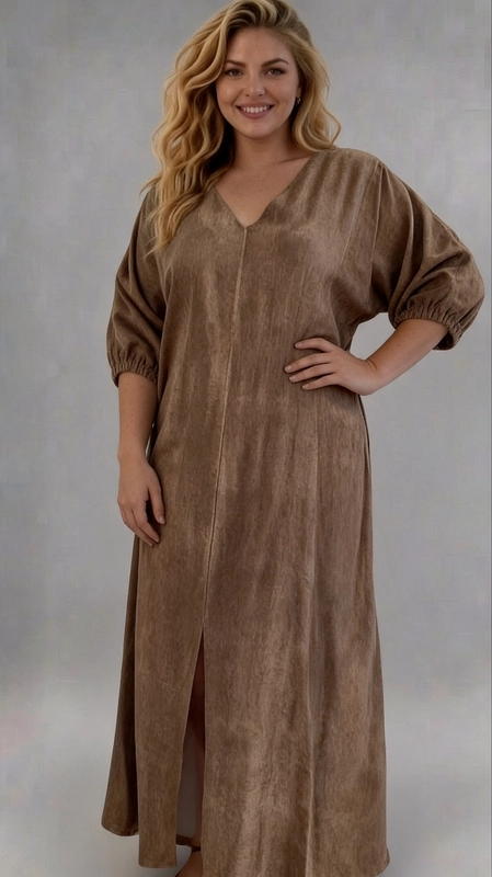 Φόρεμα καφέ καλοκαιρινό - FRW639 | Candiashop Boutique, Ένα υπέροχο maxi φόρεμα σε γήινο καφέ χρώμα που αναδεικνύει την ομορφιά κάθε γυναίκας. Η υφή του υφάσματος παρουσιάζει μια ελαφρά vintage αίσθηση με λεπτές αποχρώσεις που του προσδίδουν βάθος και χαρακτήρα. Ο κομψός λαιμός σε σχήμα V κολακεύει το ντεκολτέ, ενώ η χαλαρή, oversized γραμμή του εξασφαλίζει άνεση και ελευθερία κινήσεων για κάθε σώμα. Τα φουσκωτά μανίκια ¾ με ελαστική λεπτομέρεια στο τελείωμα προσθέτουν μια ρομαντική πινελιά, κάνοντάς το ιδιαίτερα μοδάτο. Το κεντρικό άνοιγμα στο κάτω μέρος του φορέματος δίνει μια δυναμική και σέξι νότα στο σύνολο. Ιδανικό για καλοκαιρινές εκδρομές, casual συναντήσεις ή ακόμα και για ημιεπίσημες περιστάσεις. Μπορεί να συνδυαστεί με σανδάλια για μια boho εμφάνιση, με λευκά sneakers για casual στυλ ή με ψηλοτάκουνα για βραδινές εξόδους. Ένα must-have κομμάτι για κάθε γυναίκα που αγαπά τη χαλαρή κομψότητα.