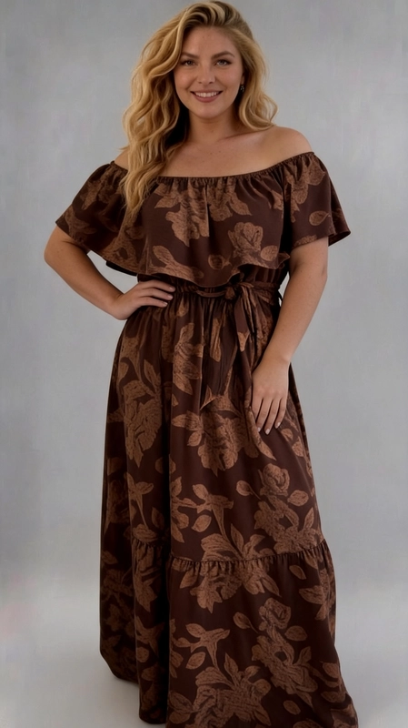 Φόρεμα καφέ καλοκαιρινό - FRW641 | Candiashop Boutique, Ένα εντυπωσιακό maxi φόρεμα σε βαθύ καφέ χρώμα με υπέροχο floral μοτίβο σε αποχρώσεις καφέ της κανέλας, που δημιουργεί ένα κομψό και γήινο αποτέλεσμα. Το σχέδιο με τα μεγάλα λουλούδια και φύλλα προσδίδει μια ρομαντική, boho αισθητική που κολακεύει κάθε σιλουέτα. Το φόρεμα διαθέτει off-shoulder γραμμή με φαρδύ βολάν στο επάνω μέρος, που προσθέτει κίνηση και θηλυκότητα. Η γραμμή αυτή είναι ιδανική για plus size σώματα, καθώς τονίζει τη μέση και δημιουργεί μια κομψή, ρέουσα σιλουέτα. Ιδανικό για καλοκαιρινές εξόδους, βραδινές εκδηλώσεις, γάμους σε εξωτερικούς χώρους ή διακοπές. Μπορεί να συνδυαστεί με χρυσά σανδάλια και ένα boho τσαντάκι για ένα ολοκληρωμένο, θηλυκό look που δεν θα περάσει απαρατήρητο.