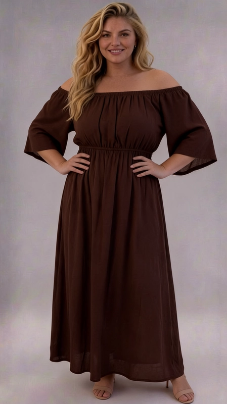 Φόρεμα καφέ καλοκαιρινό - FRW714 | Candiashop Boutique, Ένα υπέροχο maxi φόρεμα σε βαθύ καφέ χρώμα σοκολάτας που ορίζει την κομψότητα και την άνεση σε ένα μοναδικό σύνολο. Ο σχεδιασμός off-shoulder με ελαστική λαιμόκοψη που αποκαλύπτει απαλά τους ώμους δίνει μια ρομαντική και θηλυκή αίσθηση, ενώ τα φαρδιά μανίκια μεσαίου μήκους προσθέτουν μια boho-chic πινελιά. Η ελαστική μέση τονίζει τη σιλουέτα με χάρη, ενώ η φαρδιά, ρέουσα φούστα που πέφτει μέχρι τα πόδια εξασφαλίζει άψογη εφαρμογή για plus size σώματα. Το μονόχρωμο σχέδιο σε γήινο καφέ τόνο το καθιστά ευέλικτο και διαχρονικό. Ιδανικό για καλοκαιρινές εκδρομές, παραλία, καθημερινές βόλτες αλλά και βραδινές εξόδους. Μπορεί να συνδυαστεί με χρυσά αξεσουάρ, σανδάλια ή πέδιλα για ένα ολοκληρωμένο, θηλυκό look. Η ελαφριά ύφανση του υφάσματος εξασφαλίζει άνεση καθ' όλη τη διάρκεια της ημέρας.