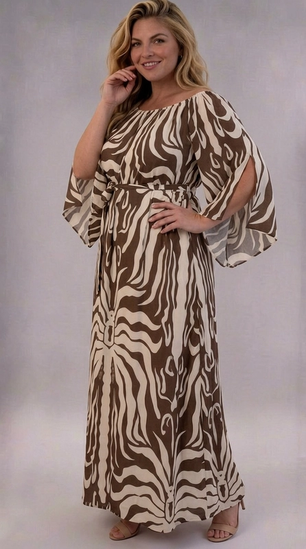Φόρεμα καφέ καλοκαιρινό - FRW716 | Candiashop Boutique, Ένα εντυπωσιακό maxi φόρεμα που συνδυάζει το animal print με την κομψότητα και την άνεση, ιδανικό για γυναίκες plus size που αγαπούν τη μόδα. Το φόρεμα διαθέτει ένα τολμηρό μοτίβο τύπου ζέβρας σε χρώματα καφέ σοκολάτας και κρεμ εκρού, που δημιουργεί μια αρμονική και εξωτική αισθητική. Η ρέουσα, ελαφριά ύφανση του υφάσματος χαρίζει μια αέρινη και θηλυκή σιλουέτα, ενώ τα φαρδιά μανίκια τύπου kimono προσθέτουν δραματική χάρη στο σύνολο. Η λαιμόκοψη και η ζώνη στη μέση ορίζουν κομψά τη γραμμή του σώματος, προσφέροντας μια κολακευτική εφαρμογή. Το φόρεμα αυτό είναι ιδανικό για καλοκαιρινές εξόδους, beach parties, καλοκαιρινά γαμήλια πάρτι ή βραδινές εκδηλώσεις. Μπορεί να συνδυαστεί με σανδάλια σε μπεζ ή χρυσό χρώμα και χρυσά αξεσουάρ για ένα ολοκληρωμένο, boho-chic αποτέλεσμα. Μια επιλογή που αναδεικνύει την προσωπικότητα και την αυτοπεποίθηση κάθε γυναίκας.