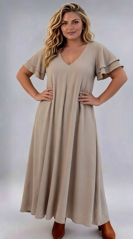 Φόρεμα κρεμ καλοκαιρινό - FRW654 | Candiashop Boutique, Ένα υπέροχο maxi φόρεμα που αναδεικνύει με χάρη και κομψότητα κάθε καμπύλη. Η V-λαιμόκοψη προσφέρει μια θηλυκή και κολακευτική γραμμή, ενώ τα διπλά βολάν στα μανίκια προσθέτουν έναν ρομαντικό και παιχνιδιάρικο τόνο στο σύνολο. Η γραμμή Α του φορέματος ξεκινά από τη μέση και απλώνεται ελεύθερα προς τα κάτω, χαρίζοντας άνεση και ελευθερία κινήσεων καθ' όλη τη διάρκεια της ημέρας. Το μονόχρωμο σχέδιο σε απαλή γήινη απόχρωση το καθιστά ιδανικό για πολλές περιστάσεις, από καλοκαιρινές βόλτες και ημερήσιες εξόδους έως γαμήλιες δεξιώσεις και επίσημα γεύματα. Μπορεί να φορεθεί με κάμελ ή λευκά πέδιλα για casual look, ή με γόβες για πιο επίσημες εμφανίσεις. Το ελαφρύ και ρέον ύφασμά του εξασφαλίζει άνεση ακόμα και τις πιο ζεστές μέρες, κάνοντάς το ένα must-have κομμάτι για κάθε γυναίκα plus size που αγαπά τη θηλυκή κομψότητα.