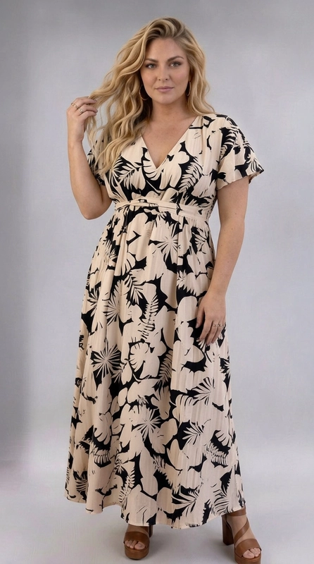 Φόρεμα κρεμ καλοκαιρινό - FRW708 | Candiashop Boutique, Ένα υπέροχο maxi φόρεμα που συνδυάζει την κομψότητα με τη θηλυκότητα, ιδανικό για γυναίκες plus size που θέλουν να αναδείξουν τη σιλουέτα τους με στιλ. Το εντυπωσιακό τροπικό μοτίβο σε εκρού και μαύρο χρώμα, με μεγάλα floral σχέδια και φύλλα φοίνικα, δημιουργεί μια δυναμική και μοντέρνα αισθητική. Το κρουαζέ ντεκολτέ σε σχήμα V χαρίζει μια αισθησιακή νότα, ενώ τα κοντά βολάν μανίκια προσδίδουν αέρινη χάρη. Η ζώνη στη μέση ορίζει τέλεια τη γραμμή του σώματος, και η φαρδιά φούστα που πέφτει ελεύθερα εξασφαλίζει άνεση καθ' όλη τη διάρκεια της ημέρας. Μπορεί να φορεθεί με καφέ ή μαύρες μπότες για ένα boho-chic αποτέλεσμα, αλλά και με σανδάλια για καλοκαιρινές εξόδους. Ιδανικό για βόλτες, γεύματα σε εξωτερικούς χώρους, καλοκαιρινές εκδηλώσεις ή ακόμα και για πιο χαλαρές επαγγελματικές περιστάσεις. Ένα φόρεμα που συνδυάζει άνεση και εκζήτηση σε ένα μοναδικό σύνολο.