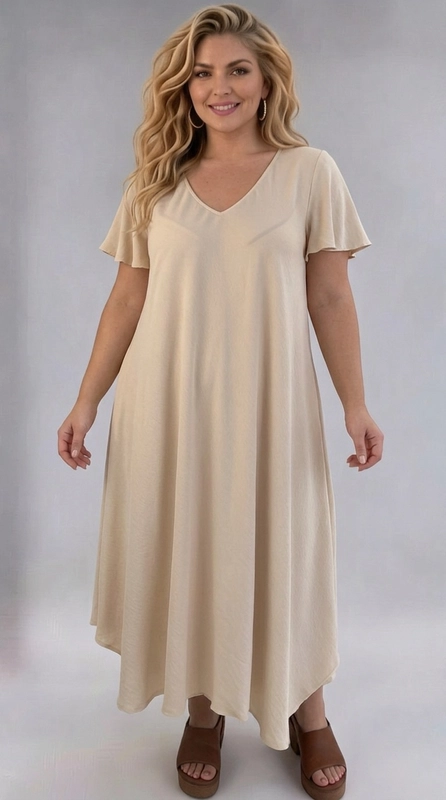 Φόρεμα κρεμ καλοκαιρινό - FRW799 | Candiashop Boutique, Ένα υπέροχο φόρεμα σε αμμώδες μπεζ χρώμα που ενσαρκώνει την αίσθηση της άνεσης και της κομψότητας. Με κοφτή V-λαιμόκοψη και φαρδιά, βολάν μανίκια που πέφτουν χαριτωμένα στους ώμους, το φόρεμα αυτό αποπνέει μια αέρινη, γυναικεία διάθεση. Η Α γραμμή του με ρέουσα σιλουέτα κολακεύει κάθε σώμα, ενώ το ασύμμετρο τελείωμα στο τελείωμα του φορέματος προσθέτει μια μοντέρνα πινελιά στο σύνολο. Ιδανικό για plus size γυναίκες που αναζητούν στυλ χωρίς συμβιβασμούς στην άνεση. Το μονόχρωμο σχέδιο σε ουδέτερο τόνο το καθιστά εύκολα συνδυάσιμο με διάφορα αξεσουάρ. Μπορεί να φορεθεί με πλατφόρμες ή σανδάλια για καλοκαιρινές εξόδους, αλλά και με ένα κομψό σακάκι για πιο επίσημες περιστάσεις. Κατάλληλο για καλοκαιρινές εκδρομές, γεύματα σε εξωτερικούς χώρους ή ακόμα και για χαλαρές καθημερινές εμφανίσεις. Ένα must-have κομμάτι για κάθε γυναικεία γκαρνταρόμπα!