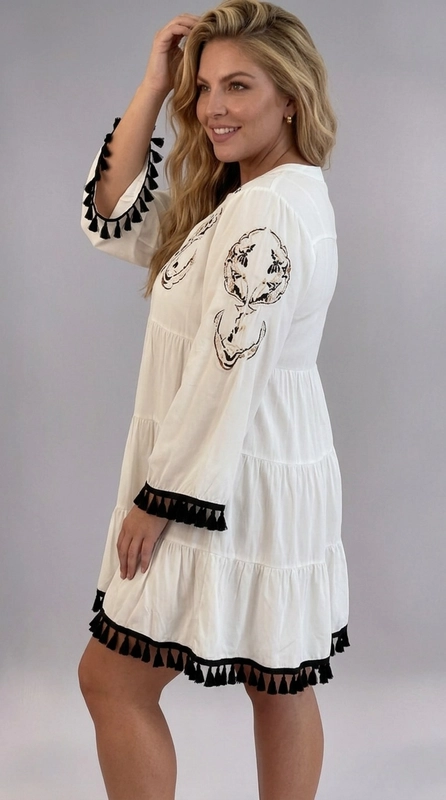 Φόρεμα λευκό καλοκαιρινό - FRW661 | Candiashop Boutique, Ένα υπέροχο boho-chic φόρεμα σε κρεμ απόχρωση που αναδεικνύει την ομορφιά και την άνεση σε κάθε σιλουέτα. Το φόρεμα διαθέτει εντυπωσιακή κεντητή διακόσμηση στο μπούστο, με μοτίβα σε μαύρο, καφέ και χρυσαφί χρώμα, που του δίνουν έναν ξεχωριστό, εθνικό χαρακτήρα. Το tiered σχέδιο με τα τρία επίπεδα εξασφαλίζει ρευστή εφαρμογή και κολακευτική γραμμή, ιδανική για plus size σώματα. Τα μακριά μανίκια με τις εντυπωσιακές μαύρες φούντες στα άκρα, καθώς και η ίδια διακόσμηση στο τελείωμα του φορέματος, προσδίδουν ένα παιχνιδιάρικο και μοδάτο άγγιγμα. Η V-λαιμόκοψη με κουμπιά στο μπούστο ολοκληρώνει το σύνολο με κομψό τρόπο. Κατάλληλο για καλοκαιρινές εκδρομές, παραλία, casual εξόδους ή φεστιβάλ. Μπορεί να συνδυαστεί με σανδάλια ή μποτάκια για ένα αέρινο, bohemian look που θα τραβήξει όλα τα βλέμματα.