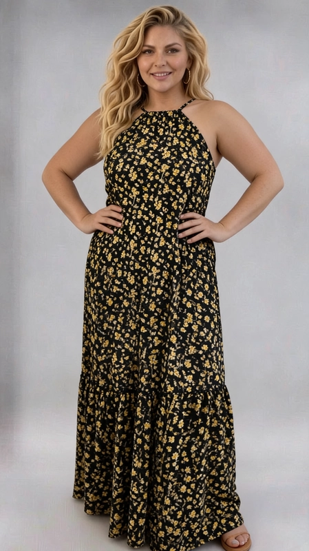 Φόρεμα μαύρο καλοκαιρινό - FRW672 | Candiashop Boutique, Ένα υπέροχο maxi φόρεμα που θα σας κάνει να ξεχωρίσετε, με εντυπωσιακό μαύρο φόντο και μικρά ανθάκια σε χρυσοκίτρινο χρώμα που απλώνονται σε όλο το ύφασμα, δημιουργώντας ένα ρομαντικό και ζωντανό αποτέλεσμα. Το φόρεμα διαθέτει halter λαιμόκοψη με λεπτές τιράντες που δένουν στον αυχένα, αναδεικνύοντας κομψά τους ώμους και τη σιλουέτα. Η γραμμή του είναι ελεύθερη και ρέουσα, με βολάν στο κάτω μέρος που προσθέτει κίνηση και θηλυκότητα, ενώ η κοπή του είναι ιδανική για plus size σώματα, προσφέροντας άνεση και στυλ ταυτόχρονα. Το ύφασμα πέφτει απαλά στο σώμα, δημιουργώντας μια αέρινη και καλοκαιρινή αίσθηση. Ιδανικό για καλοκαιρινές εξόδους, βόλτες στην παραλία, καφέ με φίλες ή ακόμα και για πιο casual εορταστικές περιστάσεις. Μπορεί να συνδυαστεί με σανδάλια ή πλατφόρμες και ένα υφαντό καλάθι τσάντα για ένα ολοκληρωμένο boho-chic look.