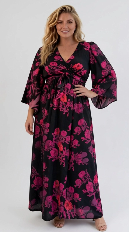 Φόρεμα μαύρο καλοκαιρινό - FRW681 | Candiashop Boutique, Ένα εντυπωσιακό maxi φόρεμα που συνδυάζει κομψότητα και θηλυκότητα σε ένα μοναδικό σχέδιο. Το βαθύ μαύρο φόντο του αναδεικνύει υπέροχα τα ζωηρά floral μοτίβα σε αποχρώσεις φούξια, ροζ-μοβ και κοραλί, δημιουργώντας ένα αποτέλεσμα που τραβά αμέσως τα βλέμματα. Η V-λαιμόκοψη και το δέσιμο στη μέση με κορδόνι ορίζουν τη σιλουέτα με χάρη, ενώ τα φαρδιά μανίκια τύπου kimono προσδίδουν ένα boho-chic ύφος που ταιριάζει απόλυτα σε plus size σώματα. Η ρέουσα γραμμή του φορέματος εξασφαλίζει άνεση και ελευθερία κινήσεων καθ' όλη τη διάρκεια της ημέρας ή της νύχτας. Ιδανικό για γάμους, βαφτίσια, εορταστικά δείπνα ή βραδινές εξόδους, μπορεί να συνδυαστεί με χρυσά ή μαύρα ψηλοτάκουνα σανδάλια και ένα μικρό clutch τσαντάκι. Ένα φόρεμα που γιορτάζει τη γυναικεία φιγούρα με στυλ και αυτοπεποίθηση.