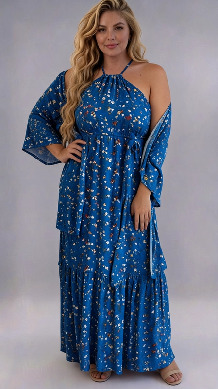 Φόρεμα μπλε καλοκαιρινό - FRW701 | Candiashop Boutique, Ένα υπέροχο maxi φόρεμα σε βαθύ μπλε χρώμα που θα σας κάνει να ξεχωρίσετε σε κάθε εμφάνιση. Το φλοράλ μοτίβο με μικρά λουλούδια σε αποχρώσεις λευκού, κόκκινου και κίτρινου δημιουργεί μια ρομαντική και φρέσκια αισθητική, ιδανική για τις ζεστές μέρες. Το φόρεμα διαθέτει κομψό halter neck ντεκολτέ με λεπτό κορδόνι στον λαιμό, ενώ τα off-shoulder μανίκια με καμπάνα προσθέτουν έναν αέρινο και θηλυκό χαρακτήρα. Η σύσφιξη κάτω από το στήθος με δέσιμο τονίζει τη σιλουέτα, ενώ η tiered γραμμή με βολάν στο κάτω μέρος χαρίζει κίνηση και χάρη στο σύνολο. Σχεδιασμένο ειδικά για plus size σώματα, προσφέρει άνεση χωρίς να θυσιάζει το στυλ. Μπορεί να φορεθεί σε καλοκαιρινές εκδρομές, βραδινές έξοδους, γάμους ή beach parties. Συνδυάστε το με σανδάλια και ένα ψάθινο καπέλο για ένα τέλειο καλοκαιρινό look.