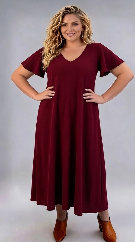 Φόρεμα μπορντό καλοκαιρινό - FRW653 | Candiashop Boutique, Ένα υπέροχο maxi φόρεμα σε βαθύ μπορντό χρώμα που αναδεικνύει την κομψότητα και τη θηλυκότητα σε κάθε περίσταση. Το σχέδιό του είναι απλό και μονόχρωμο, με καθαρές γραμμές που δίνουν μια αίσθηση εκλέπτυνσης και στιλ. Το V-λαιμόκοψη προσθέτει μια αισθησιακή πινελιά, ενώ τα φαρδιά, βολάν μανίκια προσφέρουν έναν ρομαντικό και αέρινο χαρακτήρα. Η γραμμή Α της φούστας εξασφαλίζει άνετη εφαρμογή, ιδανική για plus size σιλουέτες, καθώς αγκαλιάζει το σώμα με χάρη χωρίς να το σφίγγει. Το μήκος του φθάνει έως τον αστράγαλο, προσφέροντας κάλυψη και κομψότητα ταυτόχρονα. Μπορεί να φορεθεί με κοντόχοντρα τακούνια ή μποτάκια, όπως φαίνεται στην εικόνα, για ένα chic αποτέλεσμα. Είναι κατάλληλο για επαγγελματικές συναντήσεις, οικογενειακές εκδηλώσεις ή βραδινές έξοδοι. Ένα διαχρονικό κομμάτι που αξίζει να έχετε στη γκαρνταρόμπα σας.