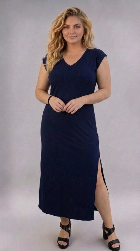 Φόρεμα σκούρο μπλε καλοκαιρινό - FRW680 | Candiashop Boutique, Ένα διαχρονικό maxi φόρεμα σε βαθύ ναυτικό μπλε χρώμα που αναδεικνύει την ομορφιά της γυναικείας σιλουέτας με κομψό και άνετο τρόπο. Το λεπτό ύφασμα προσφέρει εξαιρετική εφαρμογή, ενώ η λεία, μονόχρωμη υφή του δίνει μια αίσθηση πολυτέλειας και εκλέπτυνσης. Η V-λαιμόκοψη σχεδιασμό προσθέτει θηλυκότητα και επιμηκύνει οπτικά τον λαιμό, ενώ τα κοντά μανίκια τύπου cap sleeve προσφέρουν κάλυψη χωρίς να χάνεται η αίσθηση της ελαφρότητας. Ιδιαίτερο χαρακτηριστικό αποτελεί το πλαϊνό σκίσιμο που προσθέτει κίνηση και στυλ στο σύνολο, κάνοντάς το ακόμα πιο ελκυστικό. Ιδανικό για καλοκαιρινές βόλτες, επισκέψεις σε beach bar ή casual εξόδους, μπορεί να συνδυαστεί με σανδάλια ή πλατφόρμες για ένα ολοκληρωμένο look. Διαθέσιμο σε plus size, αγκαλιάζει κάθε σώμα με χάρη και αυτοπεποίθηση, αποτελώντας must-have κομμάτι για κάθε γυναικεία γκαρνταρόμπα.