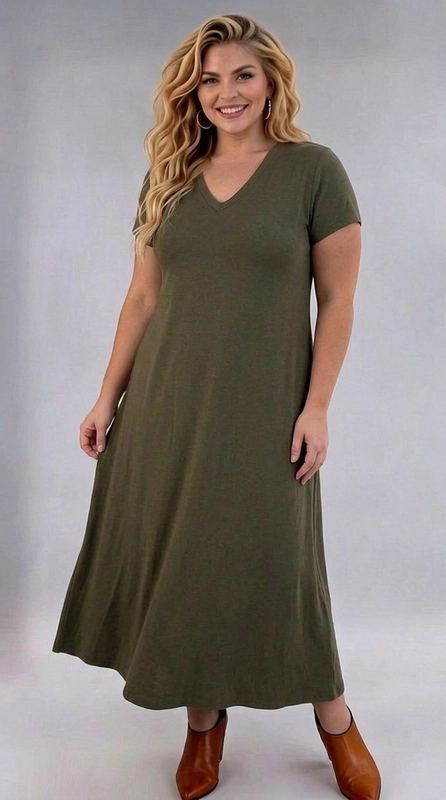 Φόρεμα χακί καλοκαιρινό - FRW801 | Candiashop Boutique, Ανακαλύψτε το απόλυτο καθημερινό φόρεμα που συνδυάζει άνεση και στυλ σε ένα μοναδικό σχέδιο. Σε βαθύ χακί χρώμα, αυτό το maxi φόρεμα αποπνέει μια διαχρονική κομψότητα που ταιριάζει σε κάθε σωματότυπο, ιδιαίτερα για plus size γυναίκες που αναζητούν κομψή εφαρμογή. Η V-λαιμόκοψη δημιουργεί μια κολακευτική γραμμή στο ντεκολτέ, ενώ τα κοντά μανίκια προσφέρουν ελευθερία κινήσεων. Η A γραμμή του χαρίζει άνετη εφαρμογή, αφήνοντας το σώμα να αναπνέει ελεύθερα. Το ύφασμα, μαλακό και ελαστικό, πέφτει υπέροχα στο σώμα φτάνοντας μέχρι τον αστράγαλο. Μπορεί να φορεθεί με κοντά μποτάκια σε κονιάκ χρώμα για ένα boho-chic αποτέλεσμα, όπως φαίνεται στη φωτογραφία, ή με λευκά sneakers για έναν πιο casual τόνο. Ιδανικό για καθημερινές εξόδους, βόλτες, ή ακόμα και για πιο χαλαρές επαγγελματικές περιστάσεις. Ένα must-have κομμάτι για κάθε γυναικεία γκαρνταρόμπα!