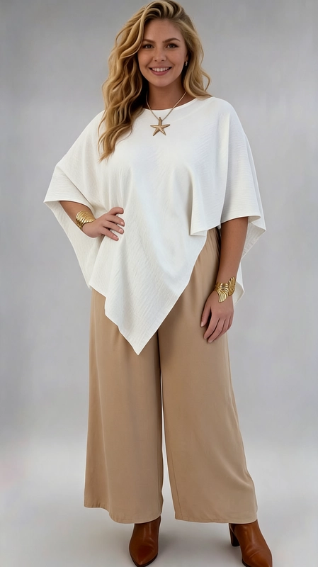 Παντελόνα γυναικεία κρεμ καλοκαιρινή plus size - PANT188 | Candiashop Boutique, Η γυναικεία παντελόνα σε μπεζ απόχρωση αποτελεί την ιδανική επιλογή για τη σύγχρονη γυναίκα που αναζητά στυλ και άνεση σε plus size μέγεθος. Με τη φαρδιά, ρέουσα γραμμή της και το κομψό palazzo κόψιμο, χαρίζει μια αέρινη και ελεύθερη σιλουέτα που κολακεύει κάθε σώμα. Το μονόχρωμο, λείο ύφασμα δίνει μια καθαρή και εκλεπτυσμένη εμφάνιση, ενώ η φαρδιά εφαρμογή εξασφαλίζει μέγιστη άνεση καθ' όλη τη διάρκεια της ημέρας. Μπορεί να συνδυαστεί με λευκή, ασύμμετρη μπλούζα, όπως φαίνεται στη φωτογραφία, δημιουργώντας ένα αρμονικό, καλοκαιρινό σύνολο. Ιδανική για καλοκαιρινές βόλτες, επαγγελματικές συναντήσεις ή χαλαρές εξόδους, η παντελόνα αυτή ανταποκρίνεται σε κάθε περίσταση. Η ουδέτερη απόχρωσή της την καθιστά εύκολα συνδυάσιμη με πλήθος χρωμάτων και στυλ, ενώ αποτελεί must-have κομμάτι για κάθε γυναικεία γκαρνταρόμπα.