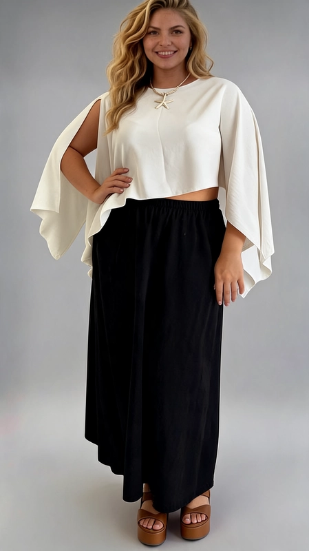 Παντελόνα γυναικεία μαύρη καλοκαιρινή plus size - PANT187 | Candiashop Boutique, Η γυναικεία παντελόνα plus size σε βαθύ μαύρο χρώμα είναι η ιδανική επιλογή για κάθε γυναίκα που αναζητά στυλ και άνεση σε ένα κομμάτι. Με κομψή midi γραμμή που πέφτει κάτω από το γόνατο, δημιουργεί μια ρευστή και θηλυκή σιλουέτα που κολακεύει κάθε σώμα. Η ελαστική μέση εξασφαλίζει άνετη εφαρμογή καθ' όλη τη διάρκεια της ημέρας, ενώ η φαρδιά κοπή στο κάτω μέρος χαρίζει ελευθερία κινήσεων. Το απλό, μονόχρωμο σχέδιο χωρίς μοτίβο την καθιστά ευέλικτο κομμάτι που συνδυάζεται εύκολα με διάφορα ανώτερα ρούχα. Μπορεί να φορεθεί με λευκή crop μπλούζα για μία chic εμφάνιση, με oversized πουκάμισο για καθημερινές εξόδους, ή με κομψή μπλούζα για επαγγελματικές συναντήσεις. Κατάλληλη για γραφείο, βόλτα στην πόλη ή βραδινή έξοδο, αποτελεί must-have κομμάτι της γκαρνταρόμπας σας που συνδυάζει άψογα το στυλ με την καθημερινή λειτουργικότητα.
