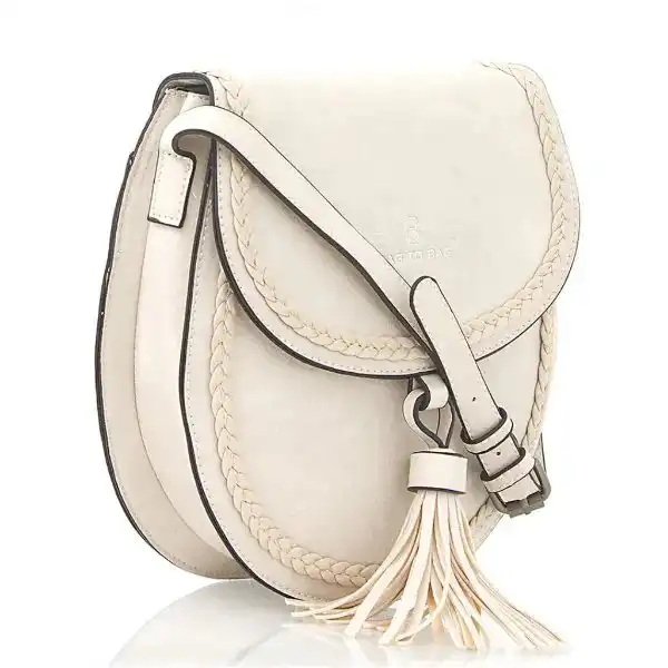 Γυναικεία τσάντα χιαστί, κυκλική, λευκή | Candiashop Boutique, Γυναικεία τσάντα χιαστί  κυκλική λευκή. Κλείνει με μαγνητικό κούμπωμα και φερμουάρ, από τεχνόδερμα.