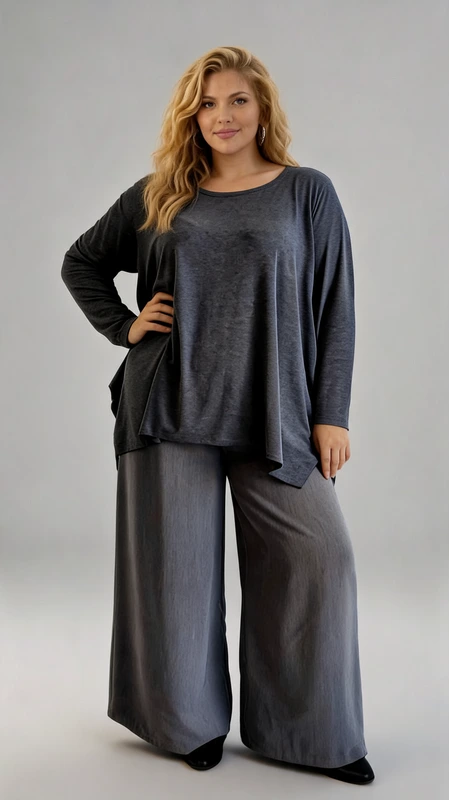 Μπλούζα γυναικεία μακρυμάνικη γκρι - MPMKRN186 | Candiashop Boutique, Αυτό το κομψό σετ σε γκρι ανθρακί αποτελεί την ιδανική επιλογή για μια άνετη αλλά στυλάτη εμφάνιση. Η μακρυμάνικη μπλούζα διαθέτει χαλαρή γραμμή με ασύμμετρο τελείωμα που χαρίζει ενδιαφέρον στη σιλουέτα, ενώ η λαιμόκοψη είναι στρογγυλή και διακριτική. Το μαλακό, ελαστικό ύφασμα προσφέρει άνεση στην κίνηση και εξαιρετική εφαρμογή. Συνδυάζεται με φαρδιά παντελόνα στην ίδια απόχρωση, δημιουργώντας ένα αρμονικό σύνολο που κολακεύει κάθε σωματότυπο. Ιδανικό για καθημερινές εξόδους, επαγγελματικές συναντήσεις ή ακόμα και για πιο επίσημες περιστάσεις όταν συνδυαστεί με τα κατάλληλα αξεσουάρ. Μπορεί να φορεθεί με μποτάκια, γόβες ή sneakers ανάλογα με την περίσταση. Το σετ προσφέρει διαχρονική κομψότητα και πρακτικότητα, ενώ η ποιότητα του υφάσματος εγγυάται διάρκεια στο χρόνο. Ένα απαραίτητο κομμάτι για την γκαρνταρόμπα κάθε γυναίκας που εκτιμά την άνεση χωρίς να θυσιάζει το στυλ.