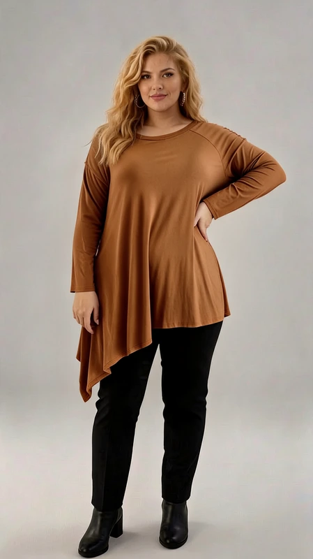 Plus size καφέ μπλούζα με ασύμμετρο κόψιμο και μακριά μανίκια. Κομψότητα και άνεση σε ένα μοναδικό σχέδιο! αυτή η μπλούζα σε ζεστή καφέ απόχρωση διαθέτει ασύμμετρο κόψιμο που προσδίδει μοντέρνα κίνηση και αέρινο στυλ. Με μακριά μανίκια και στρογγυλή λαιμόκοψη, προσφέρει ευκολία στις καθημερινές εμφανίσεις, ενώ η loose εφαρμογή της εξασφαλίζει απόλυτη άνεση. Συνδυάζεται υπέροχα με κολάν ή τζιν για ένα chic και casual look!