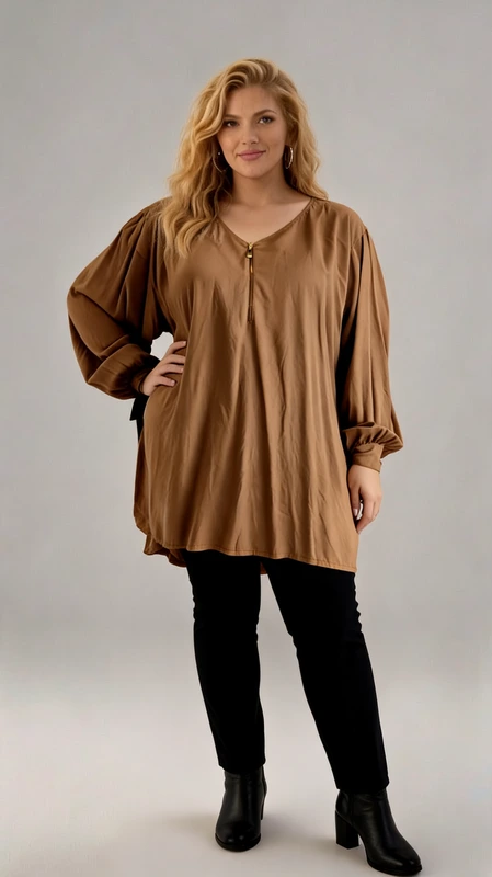 Μπλούζα γυναικεία μακρυμάνικη καφέ - MPMKRN150 | Candiashop Boutique, Plus size καφέ μπλούζα με φερμουάρ και balloon μανίκια. Αναβάθμισε το στυλ σου με αυτή την elegant και αέρινη μπλούζα! Σε ζεστή καφέ απόχρωση, διαθέτει V λαιμόκοψη με διακοσμητικό φερμουάρ που προσθέτει μια μοντέρνα πινελιά. Τα balloon μανίκια με σούρες στις μανσέτες χαρίζουν θηλυκότητα και κομψότητα, ενώ η loose εφαρμογή εξασφαλίζει άνεση όλη μέρα. Ιδανική για casual αλλά και πιο formal εμφανίσεις, φοριέται υπέροχα με παντελόνι ή κολάν για ένα effortlessly chic αποτέλεσμα!