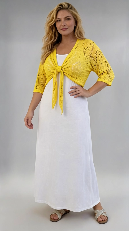 Μπολερό κίτρινο καλοκαιρινό plus size - BOL111 | Candiashop Boutique, Ανακαλύψτε το τέλειο καλοκαιρινό αξεσουάρ με αυτό το εντυπωσιακό μπολερό σε ζωηρό κίτρινο χρώμα, που θα φωτίσει κάθε σας εμφάνιση. Κατασκευασμένο από διάτρητο πλεκτό ύφασμα με κομψά floral μοτίβα, προσφέρει μια αέρινη και ρομαντική αίσθηση, ιδανική για τις ζεστές καλοκαιρινές μέρες. Τα μανίκια τρία τέταρτα προσθέτουν κομψότητα, ενώ η crop γραμμή του το κάνει ιδανικό για plus size γυναίκες που θέλουν να αναδείξουν τις καμπύλες τους με στυλ. Μπορεί να φορεθεί πάνω από λευκό maxi φόρεμα ή φούστα για ένα chic καλοκαιρινό σύνολο, αλλά και με τζιν σορτς για μια πιο casual εμφάνιση. Κατάλληλο για βόλτες στην παραλία, καλοκαιρινές εκδρομές ή χαλαρές συναντήσεις με φίλους.