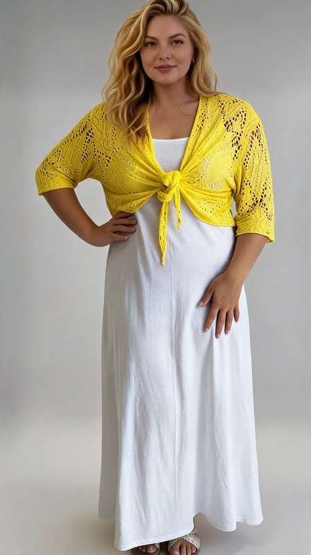 Μπολερό κίτρινο καλοκαιρινό plus size - BOL111 | Candiashop Boutique, Ανακαλύψτε το τέλειο καλοκαιρινό αξεσουάρ με αυτό το εντυπωσιακό μπολερό σε ζωηρό κίτρινο χρώμα, που θα φωτίσει κάθε σας εμφάνιση. Κατασκευασμένο από διάτρητο πλεκτό ύφασμα με κομψά floral μοτίβα, προσφέρει μια αέρινη και ρομαντική αίσθηση, ιδανική για τις ζεστές καλοκαιρινές μέρες. Τα μανίκια τρία τέταρτα προσθέτουν κομψότητα, ενώ η crop γραμμή του το κάνει ιδανικό για plus size γυναίκες που θέλουν να αναδείξουν τις καμπύλες τους με στυλ. Μπορεί να φορεθεί πάνω από λευκό maxi φόρεμα ή φούστα για ένα chic καλοκαιρινό σύνολο, αλλά και με τζιν σορτς για μια πιο casual εμφάνιση. Κατάλληλο για βόλτες στην παραλία, καλοκαιρινές εκδρομές ή χαλαρές συναντήσεις με φίλους.