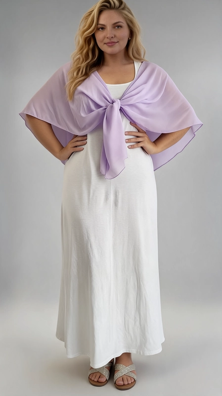 Μπολερό λιλά καλοκαιρινό plus size - BOL120 | Candiashop Boutique, Ανακαλύψτε την κομψότητα με αυτό το υπέροχο καλοκαιρινό μπολερό σε γοητευτική απόχρωση λιλά. Κατασκευασμένο από ελαφρύ, διαφανές ύφασμα, χαρίζει μια αέρινη και ρομαντική αίσθηση που ταιριάζει απόλυτα στις ζεστές καλοκαιρινές μέρες. Το μονόχρωμο σχέδιο του σε απαλό μοβ-λιλά δίνει μια εκλεπτυσμένη πινελιά στο σύνολό σας, ενώ το κούμπωμα με φιόγκο στο μπροστινό μέρος προσθέτει έναν παιχνιδιάρικο και θηλυκό χαρακτήρα. Η ευρύχωρη γραμμή του το καθιστά ιδανικό για plus size σιλουέτες, προσφέροντας άνεση χωρίς να θυσιάζει το στυλ. Μπορεί να φορεθεί πάνω από λευκά ή μονόχρωμα φορέματα, δημιουργώντας ένα αρμονικό και κομψό σύνολο. Είναι η τέλεια επιλογή για γάμους, βαφτίσια, καλοκαιρινές εκδηλώσεις, αλλά και για βραδινές έξοδους. Συνδυάστε το με σανδάλια και αξεσουάρ σε ουδέτερες αποχρώσεις για ένα αψεγάδιαστο αποτέλεσμα που θα σας κάνει να ξεχωρίζετε.