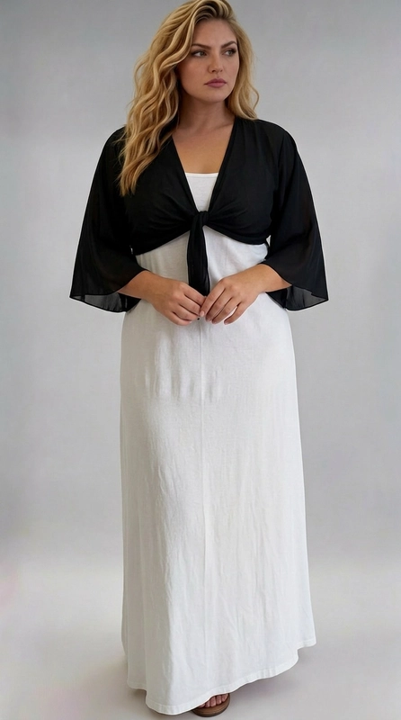 Μπολερό μαύρο καλοκαιρινό plus size - BOL124 | Candiashop Boutique, Ανακαλύψτε το τέλειο καλοκαιρινό αξεσουάρ που θα μεταμορφώσει κάθε σας εμφάνιση! Αυτό το κομψό γυναικείο μπολερό σε βαθύ μαύρο χρώμα είναι ραμμένο από ελαφριά, διάφανη σιφόν ύφανση που χαρίζει αέρινη κίνηση και θηλυκότητα. Το ιδιαίτερο χαρακτηριστικό του είναι το δέσιμο μπροστά με κόμπο, που δημιουργεί έναν ορισμένο και κολακευτικό σιλουέτ, ιδανικό για plus size γυναίκες. Τα φαρδιά μανίκια τύπου kimono προσθέτουν μια boho-chic αίσθηση, ενώ η ημιδιάφανη υφή του υφάσματος το καθιστά ιδανικό για ζεστές καλοκαιρινές μέρες. Μπορεί να φορεθεί με λευκό maxi φόρεμα, όπως φαίνεται στη φωτογραφία, δημιουργώντας ένα εντυπωσιακό δίχρωμο σύνολο, αλλά και με ψηλόμεσο παντελόνι ή φούστα για ένα casual chic αποτέλεσμα. Κατάλληλο για βραδινές έξοδους, καλοκαιρινές εκδηλώσεις, γάμους ή για μια χαλαρή βόλτα στην παραλία. Ένα must-have κομμάτι που συνδυάζει άνεση και στυλ αριστοτεχνικά!