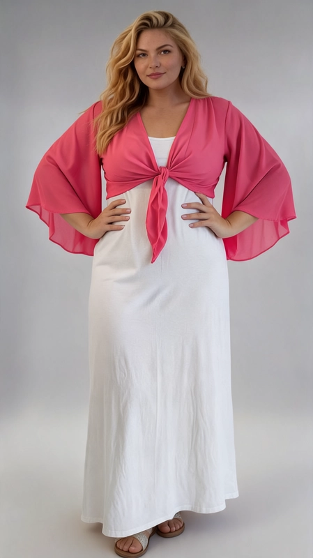 Μπολερό ροζ καλοκαιρινό plus size - BOL121 | Candiashop Boutique, Ανακαλύψτε το απόλυτο καλοκαιρινό αξεσουάρ με αυτό το εντυπωσιακό μπολερό σε ζωηρό φούξια χρώμα, που θα μεταμορφώσει κάθε σας εμφάνιση. Κατασκευασμένο από ελαφρύ, διάφανο ύφασμα σιφόν, προσφέρει μια αέρινη και θηλυκή αίσθηση, ιδανική για τις ζεστές καλοκαιρινές μέρες. Το κύριο χαρακτηριστικό του είναι τα φαρδιά, butterfly μανίκια που κυματίζουν χαριτωμένα με κάθε κίνηση, δημιουργώντας μια ρομαντική και κομψή σιλουέτα. Το μπροστινό δέσιμο με κόμπο προσθέτει έναν παιχνιδιάρικο χαρακτήρα, ενώ παράλληλα τονίζει τη μέση με κολακευτικό τρόπο, κάνοντάς το ιδιαίτερα κατάλληλο για plus size γυναίκες. Μπορεί να φορεθεί πάνω από λευκό ή μονόχρωμο φόρεμα, όπως φαίνεται στη φωτογραφία, αλλά και με ψηλόμεσο παντελόνι ή φούστα. Είναι η τέλεια επιλογή για βραδινές έξοδους, καλοκαιρινές εκδηλώσεις, γάμους ή ακόμα και για μια χαλαρή βόλτα. Το έντονο φούξια χρώμα του εγγυάται ότι θα τραβήξει όλα τα βλέμματα!