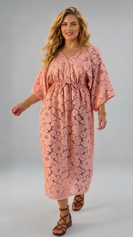 Plus size φόρεμα καλοκαιρινό σομόν - FRW468 | Candiashop Boutique, Αυτό το εντυπωσιακό φόρεμα σε απαλό σομόν-τερακότα χρώμα είναι ιδανικό για καλοκαιρινές βαπτίσεις και κομψές περιστάσεις. Διαθέτει εξαιρετικό δαντελένιο μοτίβο με λεπτομερή λουλουδάτα σχέδια που προσδίδουν κομψότητα και θηλυκότητα. Η άνετη καφτάνικη γραμμή με τα φαρδιά μανίκια τύπου κιμονό προσφέρει ελευθερία κινήσεων, ενώ η ζώνη στη μέση τονίζει διακριτικά τη σιλουέτα χαρίζοντας κολακευτική εφαρμογή. Το μάξι μήκος του φορέματος προσφέρει κομψότητα, ενώ το V στο ντεκολτέ αναδεικνύει τον λαιμό με χάρη. Ιδανικό για περιστάσεις όπως βαπτίσεις, καλοκαιρινούς γάμους ή κοκτέιλ πάρτι, μπορεί να συνδυαστεί με λεπτά πέδιλα και διακριτικά κοσμήματα για ολοκληρωμένο στυλ. Το ανάλαφρο ύφασμα είναι ιδανικό για τις ζεστές καλοκαιρινές μέρες, προσφέροντας άνεση και στυλ. Διατίθεται σε διάφορα μεγέθη για να ταιριάζει σε κάθε σωματότυπο, χαρίζοντας αέρινη και κομψή εμφάνιση σε κάθε περίσταση.