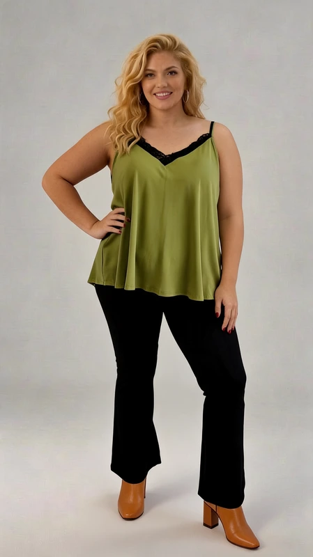 Το plus size lingerie top πράσινο είναι ιδανικό μεσοφόρι για όλες τις εποχές του χρόνου. Από βισκόζη ελαστική και δαντέλα. Διάλεξε το αγαπημένο σου χρώμα και φώτισε το σκούρο κοστούμι σου!