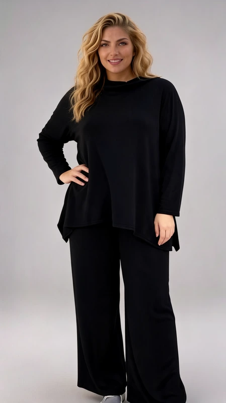 Σετ γυναικείο plus size, ελαστικό, μαύρο με γυναικεία μπλούζα ασύμμετρη που συνοδεύεται με πατελόνα.