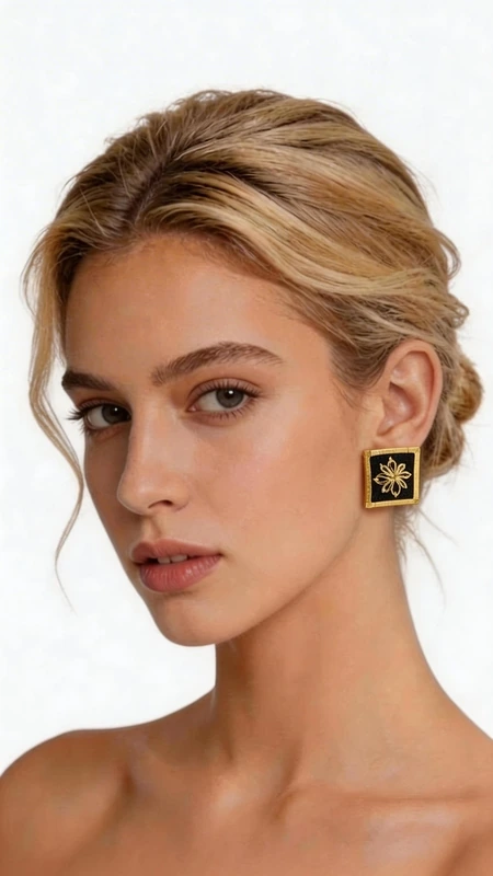 Κεντητά σκουλαρίκια statement με γεωμετρικά σχέδια από χρυσοκλωστή σε μαύρο - SKOUL-4723 | Candiashop Boutique, Τα εντυπωσιακά statement σκουλαρίκια με κεντητά γεωμετρικά σχέδια σε μαύρο φόντο θα γίνουν το επίκεντρο κάθε σας εμφάνισης. Αυτά τα μοναδικά χειροποίητα σκουλαρίκια, σχεδιασμένα από την Ελληνίδα Σχεδιάστρια Κοσμημάτων Αικατερίνη Χαλκιαδάκη, συνδυάζουν την παραδοσιακή τεχνική του κεντήματος με χρυσοκλωστή και τη σύγχρονη αισθητική. Κάθε σκουλαρίκι φέρει περίτεχνα κεντητά γεωμετρικά μοτίβα που ξεχωρίζουν πάνω στο βαθύ μαύρο φόντο, δημιουργώντας μια εκπληκτική αντίθεση που τραβάει όλα τα βλέμματα. Η χρυσοκλωστή προσθέτει μια πολυτελή λάμψη, ενώ ο τετράγωνος σχεδιασμός τους τα καθιστά ιδανικά για μοντέρνες γυναίκες που αγαπούν να ξεχωρίζουν. Αυτά τα εντυπωσιακά κρεμαστά σκουλαρίκια είναι τέλεια για ειδικές περιστάσεις, γάμους ή βραδινές εξόδους, αλλά μπορούν εξίσου εύκολα να αναβαθμίσουν και ένα καθημερινό ντύσιμο. Η ελληνική χειροτεχνία τους εγγυάται την ποιότητα και τη μοναδικότητά τους. Υλικό: Ορείχαλκος, Ύφασμα Φροντίστε τα απαλά με μαλακό πανί και αποφύγετε την επαφή με νερό και αρώματα για να διατηρήσουν τη λάμψη τους.